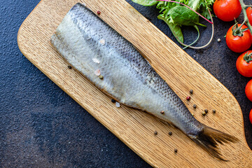 herring fish raw seafood serving size natural product top view place for text copy space keto or paleo diet pescetarian 
