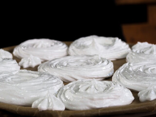 making meringue cakes. egg white meringue. pastry shop. sweet