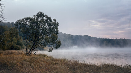 Foggy morning on the lake in autumn, Russia, Ural