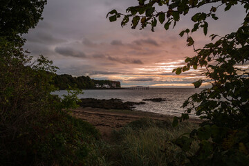 Sunrise on the rocky beach of Aberdour, Scotland, United Kingdom