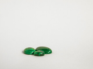 Natural malachite stones on white background