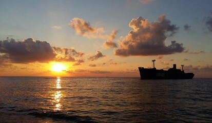 ship in the sunset on the sea 