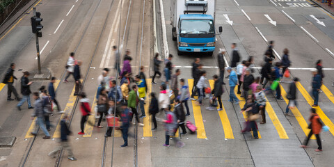 Motion blurred pedestrians crossing street in Hong Kong　横断歩道を渡る人々 香港
