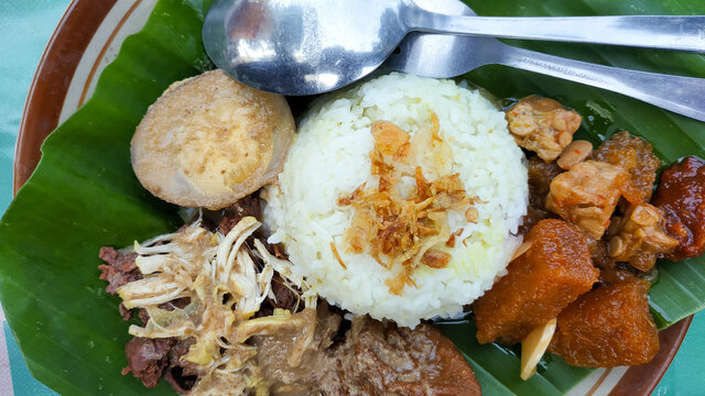 Nasi Gudeg Krecek, traditional Food From Yogyakarta Indonesia, Made From Jake fruit served with chicken meat, egg and tofu