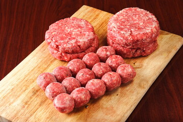 raw minced meat on wooden board