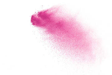 Freeze motion of pink color powder exploding on white  background. 
