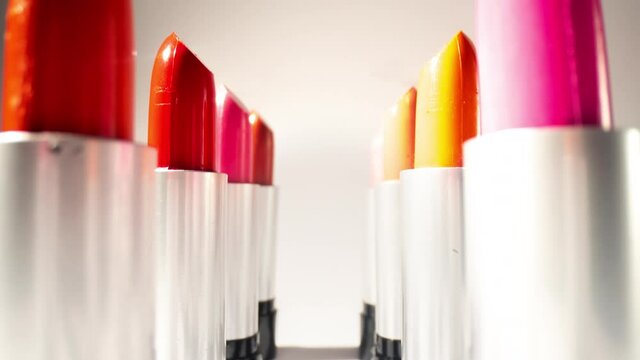 Close up video of lipsticks in studio
