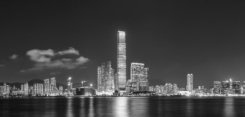 Panorama of skyline of Victoria harbor of Hong Kong city at night