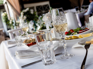 Glasses of champagne on the table in the restaurant.