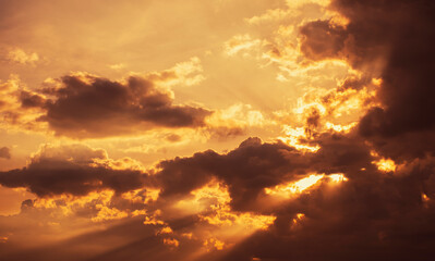 sun shining through clouds, sunset background