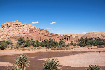 Fototapeta na wymiar Ait ben haddou unesco village morocco. Earthen clay building. Traditional village, heritage morocco. Fortified town on a hill with river in the valley. 