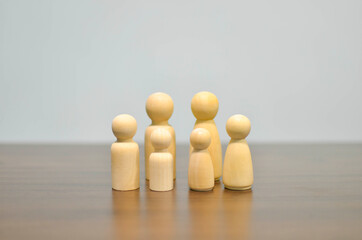 Family members on blur background. family concept from peg doll. Selective focus.