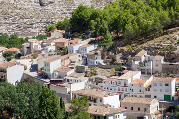 Obraz premium Old houses in Alcala del Jucar, Albacete, a picturesque and beatiful village in Spain. Castile-La Mancha