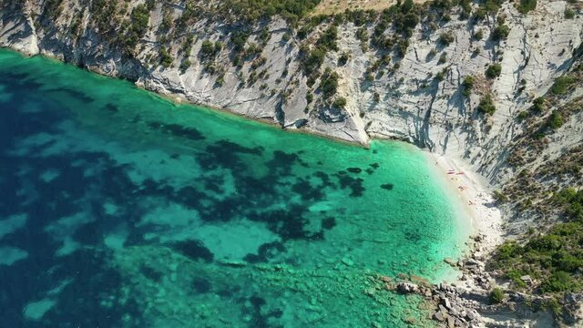 Aerial drone video of beautiful paradise bay of Afales and white beach in beautiful Ionian island of Ithaki or Ithaca, Greece