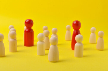 Business & HR global wood puzzle concept for leadership and team with peg doll. Selective focus.