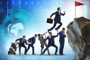 Career progression concept with businessman climbing stairs