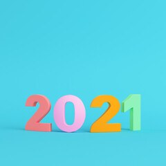 Colorful 2021 digits on bright blue background in pastel colors. Minimalism concept
