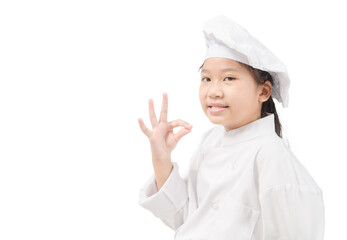Happy asian girl chef in uniform showing OK sign  isolated