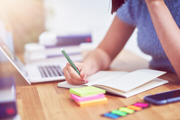 Teenage girl having online classes at home