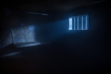 Jail or prison cell. Old grunge prison miniature. Dark prison interior creative decoration. Empty...