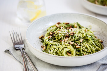 Close up of capellini with roasted lemon rocket pesto served on plate