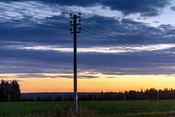 Fototapeta na wymiar Power lines at sunset
