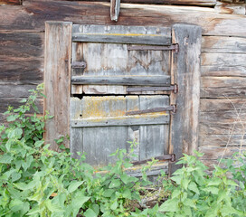 Door in a very old cabin in Switzerland