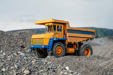 Excavation work in a mountainous wooded area. A dump truck during a pause.