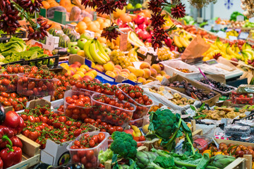 Colorful fruit and vegetable stand in local market.