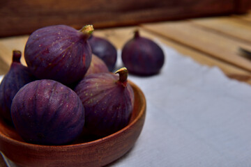 Black figs with a wooden background