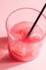 Halloween party pink mocktail lemonade with brain jelly candy in glass. Selective focus