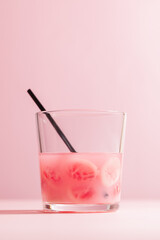 Halloween party pink mocktail lemonade with brain jelly candy in glass. Copy space, selective focus