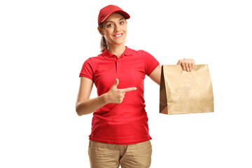 Female food delivery worker holding a bag and pointing