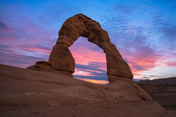 Delicate Arch vibrant sunrise in Arches National Park