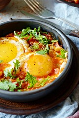 Tasty Shakshuka, Fried Eggs in Tomato Sauce for Easter Brunch. Eggs Poached in Spicy Tomato Pepper Sauce. Breakfast