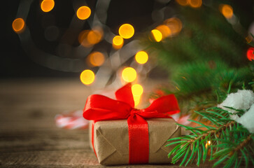 Christmas gift box. Christmas presents in red boxes at wooden table. Flat lay with copy space. wooden background. Winter holidays, New Year.Flat lay, top view, copy space. Selective focus.