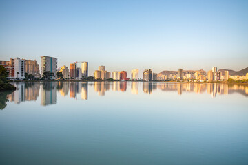 Fototapeta na wymiar Reflection of the city of Calpe in the water