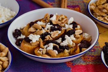 Capirotada side view, a traditional sweet food from Michoacan, Mexico