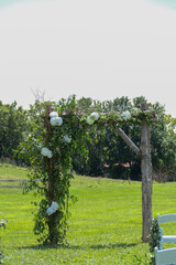 rustic archway decorated for a wedding