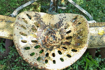 old rusty tractor seat