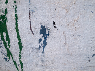 Paint stains on a white wall