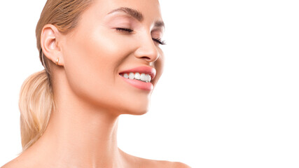Fototapeta premium Portrait of a smiling young woman with closed eyes.