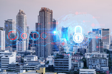Fototapeta na wymiar Padlock icon hologram over panorama city view of Bangkok to protect business in Asia. The concept of information security shields. Double exposure.