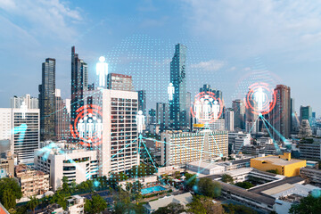Fototapeta premium Social media icons hologram over panorama city view of Bangkok, Asia. The concept of people networking and connections. Double exposure.