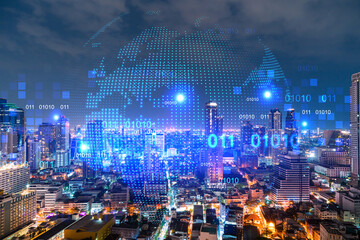 Fototapeta na wymiar Hologram of Earth planet map on night panoramic cityscape of Bangkok, Asia. The concept of international companies. Multi Exposure.