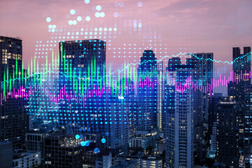 Market behavior graph hologram, sunset panoramic city view of Bangkok, popular location to achieve...
