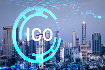 Hologram of glowing ICO icon, sunset panoramic city view of Bangkok, startup incubator of cryptocurrency projects in Asia. The concept of affordable opportunities in new era. Double exposure.