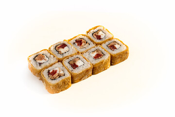 photo of sushi rolls on a white background