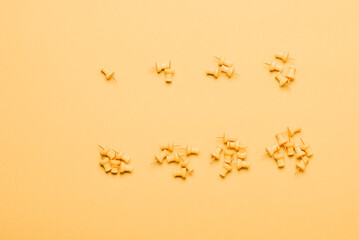 Set of 8 yellow push pins in grupes to cutoff