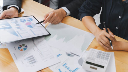 Accountant team working with valuation report.